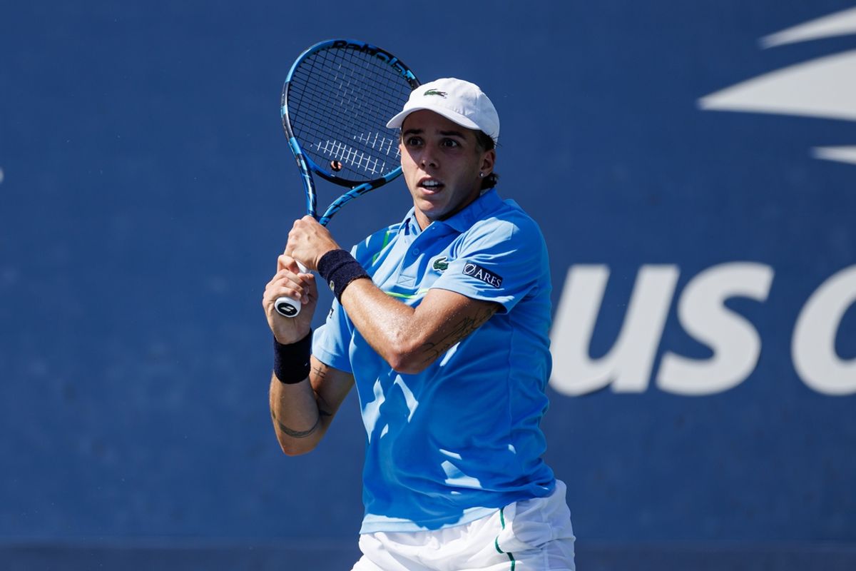 Aug 28, 2024; Flushing, NY, USA;  Arthur Cazaux of France in action against Brandon Nakashima of the United States on day three of the 2024 U.S. Open tennis tournament at the USTA Billie Jean King National Tennis Center. Mandatory Credit: Mike Frey-Imagn Images