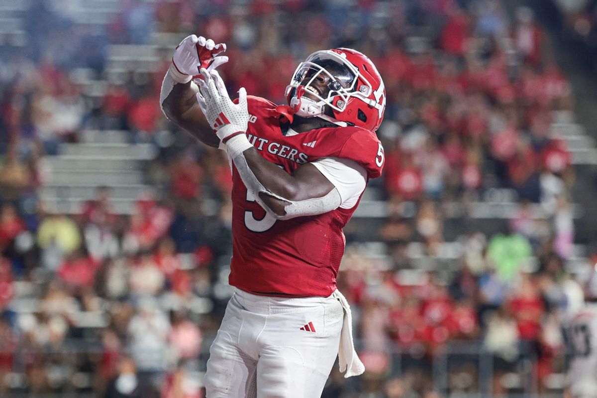 Aug 29, 2024; Piscataway, New Jersey, USA;  Rutgers Scarlet Knights running back Kyle Monangai (5) celebrates after a touchdown during the second half against the Howard Bison at SHI Stadium. Mandatory Credit: Vincent Carchietta-Imagn Images
