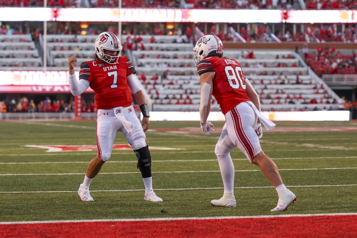 Aug 29, 2024; Salt Lake City, Utah, USA; Utah Utes quarterback Cameron Rising (7) and tight end Brant Kuithe (80) celebrate a touchdown against the Southern Utah Thunderbirds during the second quarter at Rice-Eccles Stadium. Mandatory Credit: Rob Gray-USA TODAY Sports