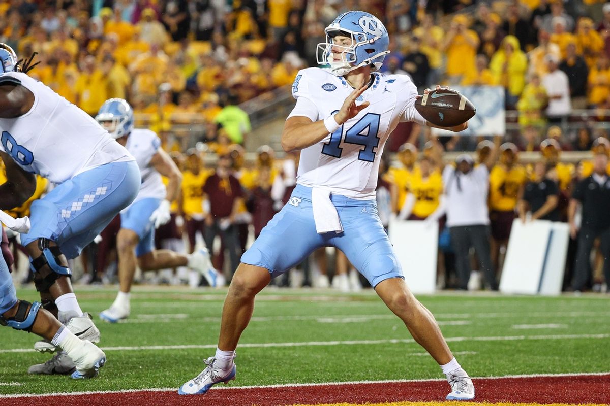 Aug 29, 2024; Minneapolis, Minnesota, USA; North Carolina Tar Heels quarterback Max Johnson (14) throws the ball against the Minnesota Golden Gophers during the first half at Huntington Bank Stadium. Mandatory Credit: Matt Krohn-Imagn Images