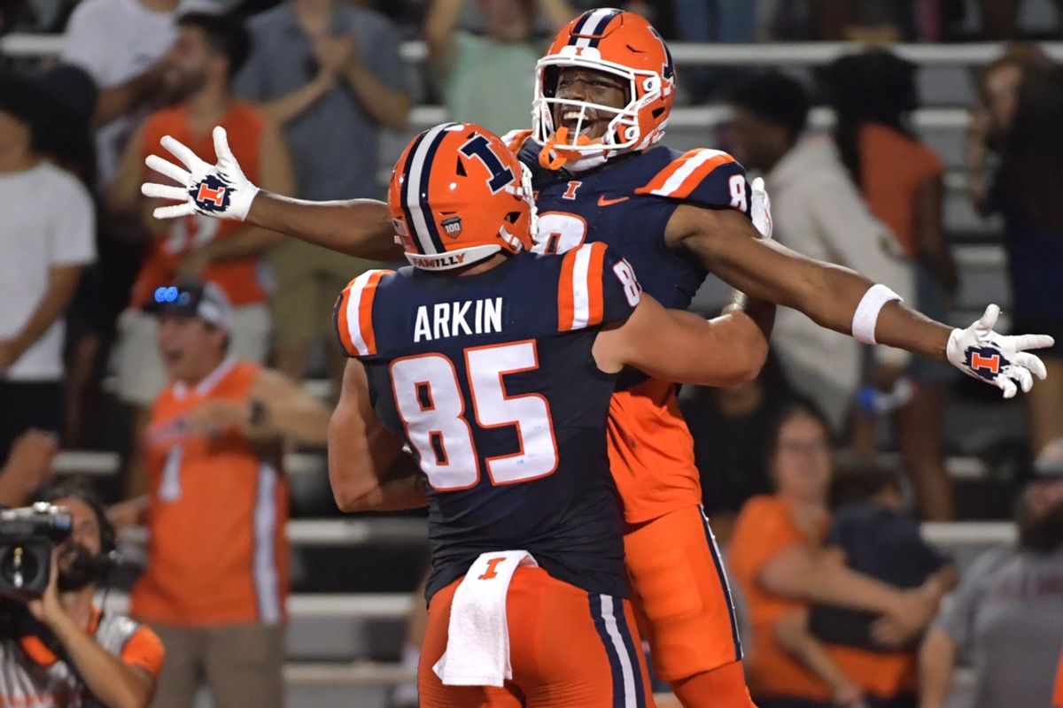 Aug 29, 2024; Champaign, Illinois, USA;  Illinois Fighting Illini tight end Tanner Arkin (85) celebrates teammate Illinois wide receiver Malik Elzy (8) touchdown during the first half at Memorial Stadium. Mandatory Credit: Ron Johnson-USA TODAY Sports
