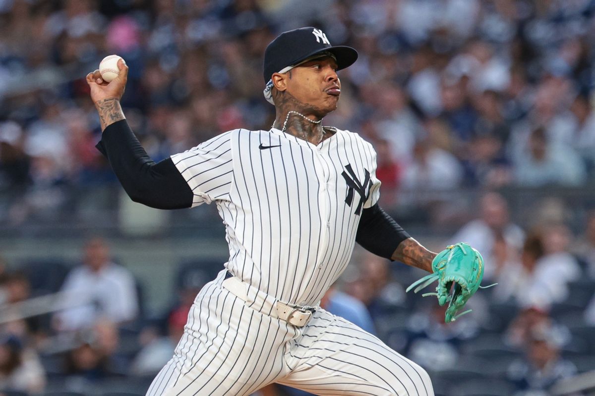 Aug 30, 2024; Bronx, New York, USA; New York Yankees starting pitcher Marcus Stroman (0) delivers a pitch during the first inning against the St. Louis Cardinals at Yankee Stadium. Mandatory Credit: Vincent Carchietta-Imagn Images