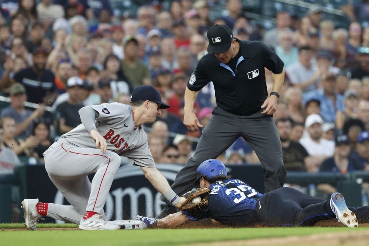 Aug 30, 2024; Detroit, Michigan, USA; Detroit Tigers shortstop Zach McKinstry (39) is tagged out at third by Boston Red Sox Nick Sogard (75) in the fifth inning at Comerica Park. Mandatory Credit: Rick Osentoski-USA TODAY Sports