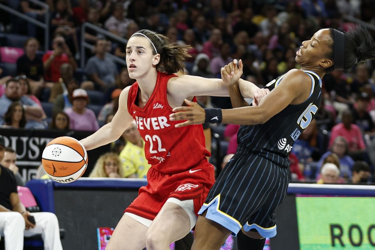 Aug 30, 2024; Chicago, Illinois, USA; Indiana Fever guard Caitlin Clark (22) drives to the basket against Chicago Sky guard Lindsay Allen (15) during the first half at Wintrust Arena. Mandatory Credit: Kamil Krzaczynski-USA TODAY Sports