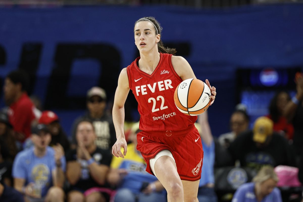 Aug 30, 2024; Chicago, Illinois, USA; Indiana Fever guard Caitlin Clark (22) brings the ball up court against the Chicago Sky during the first half at Wintrust Arena. Mandatory Credit: Kamil Krzaczynski-USA TODAY Sports