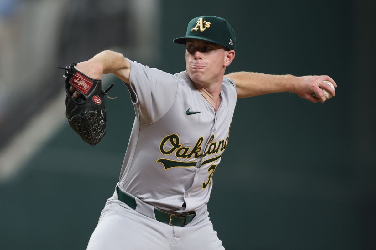 Aug 30, 2024; Arlington, Texas, USA; Oakland Athletics pitcher JP Sears (38) pitches against the Texas Rangers in the third inning at Globe Life Field. Mandatory Credit: Tim Heitman-Imagn Images