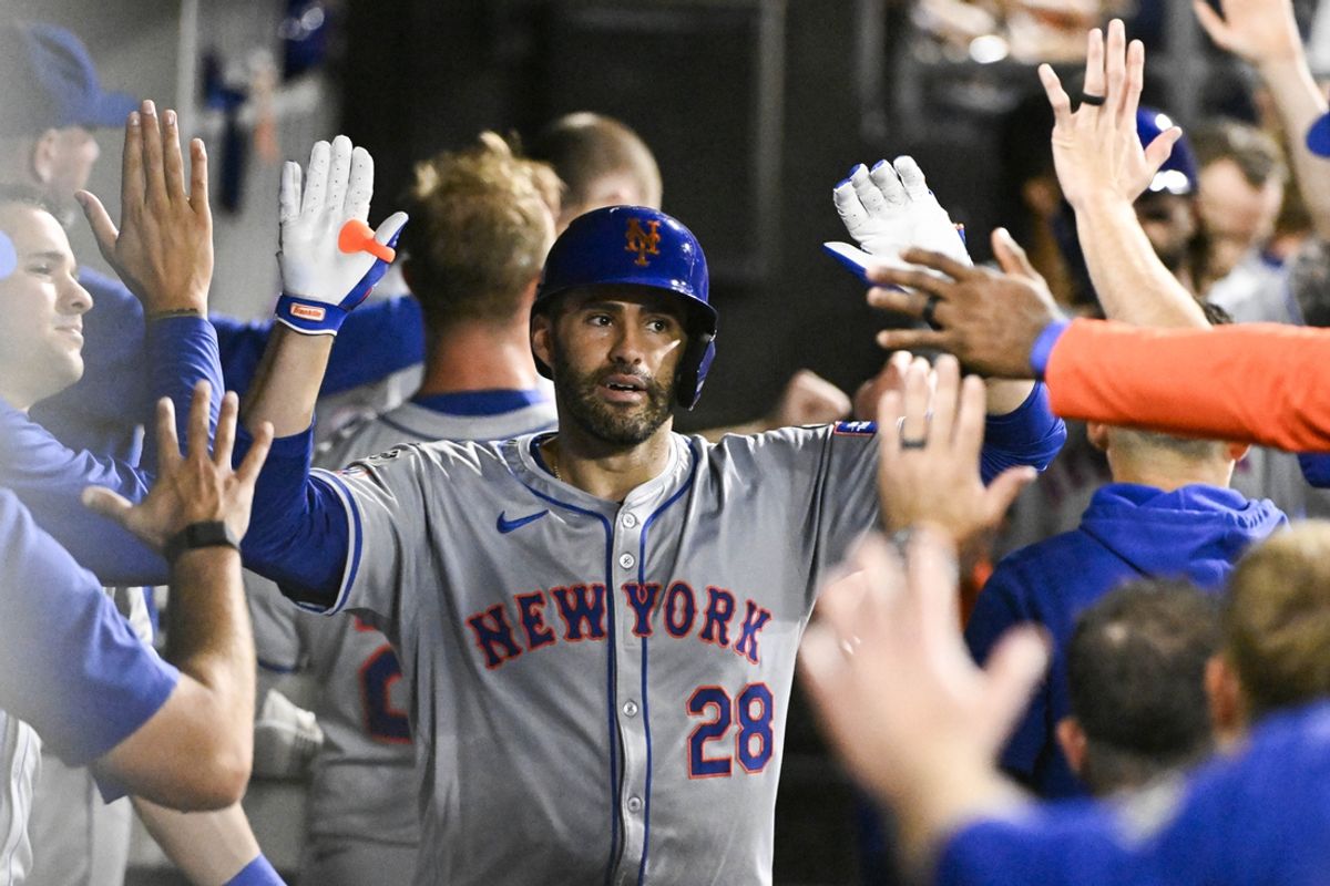 Aug 30, 2024; Chicago, Illinois, USA; New York Mets designated hitter J.D. Martinez (28) celebrates in the dugout after he hits a two-run home run against the Chicago White Sox during the third inning at Guaranteed Rate Field. Mandatory Credit: Matt Marton-Imagn Images