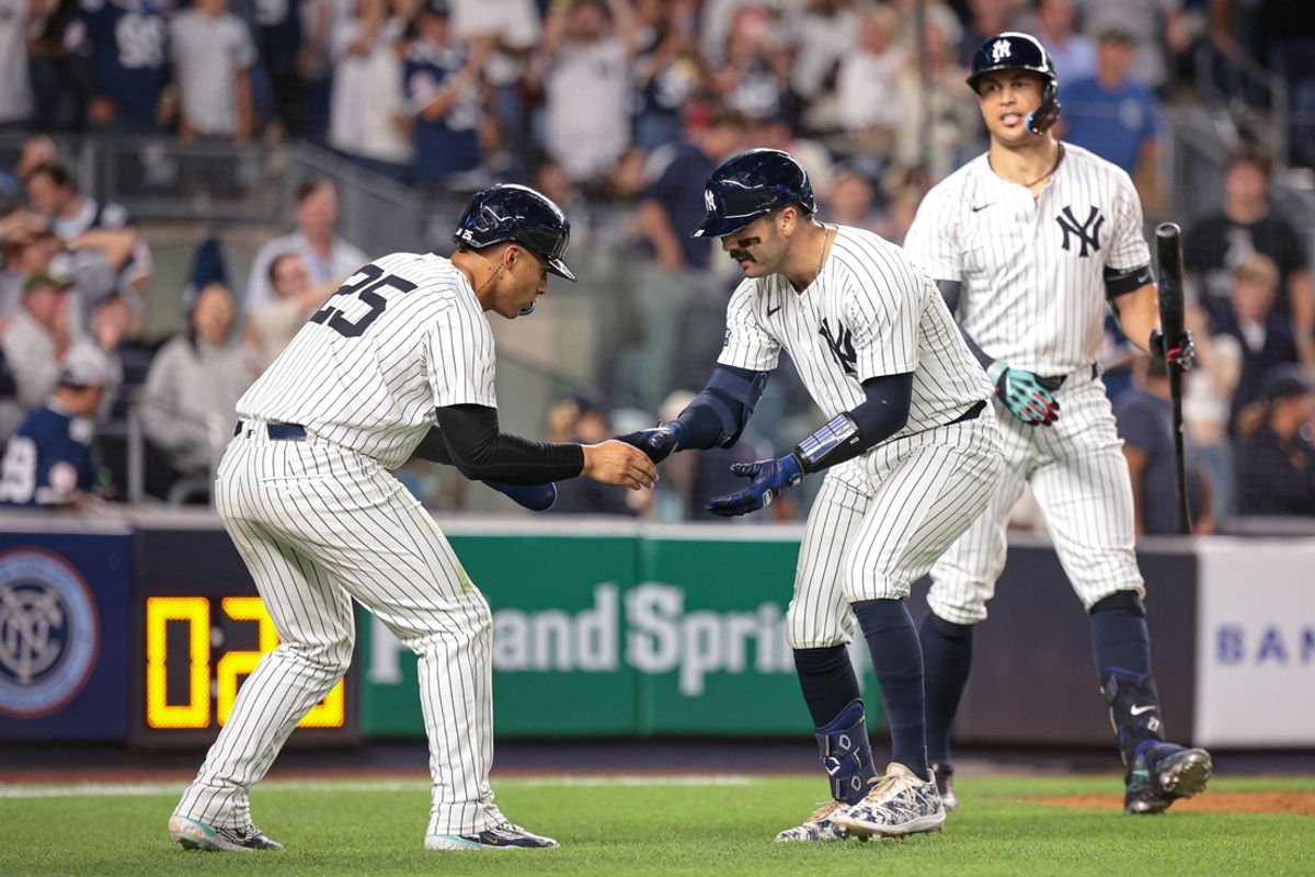 Aug 30, 2024; Bronx, New York, USA; New York Yankees catcher Austin Wells (28) celebrates with second baseman Gleyber Torres (25) after hitting a two run home run during the eighth inning against the St. Louis Cardinals at Yankee Stadium. Mandatory Credit: Vincent Carchietta-USA TODAY Sports