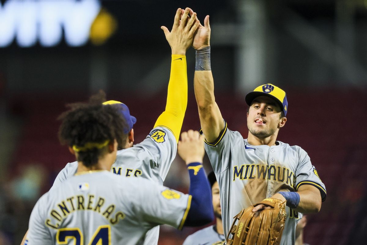Aug 30, 2024; Cincinnati, Ohio, USA; Milwaukee Brewers outfielder Sal Frelick (10) high fives shortstop Willy Adames (27) after the victory over the Cincinnati Reds at Great American Ball Park. Mandatory Credit: Katie Stratman-USA TODAY Sports