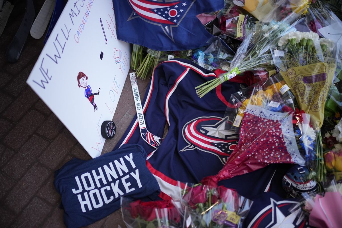 Aug 30, 2024; Columbus, OH, USA; A makeshift memorial grows outside Nationwide Arena for Columbus Blue Jackets forward Johnny Gaudreau. Gaudreau and his brother, Matthew, were killed in a bicycle accident the night before. Mandatory Credit: Adam Cairns/Columbus Dispatch-USA TODAY Network