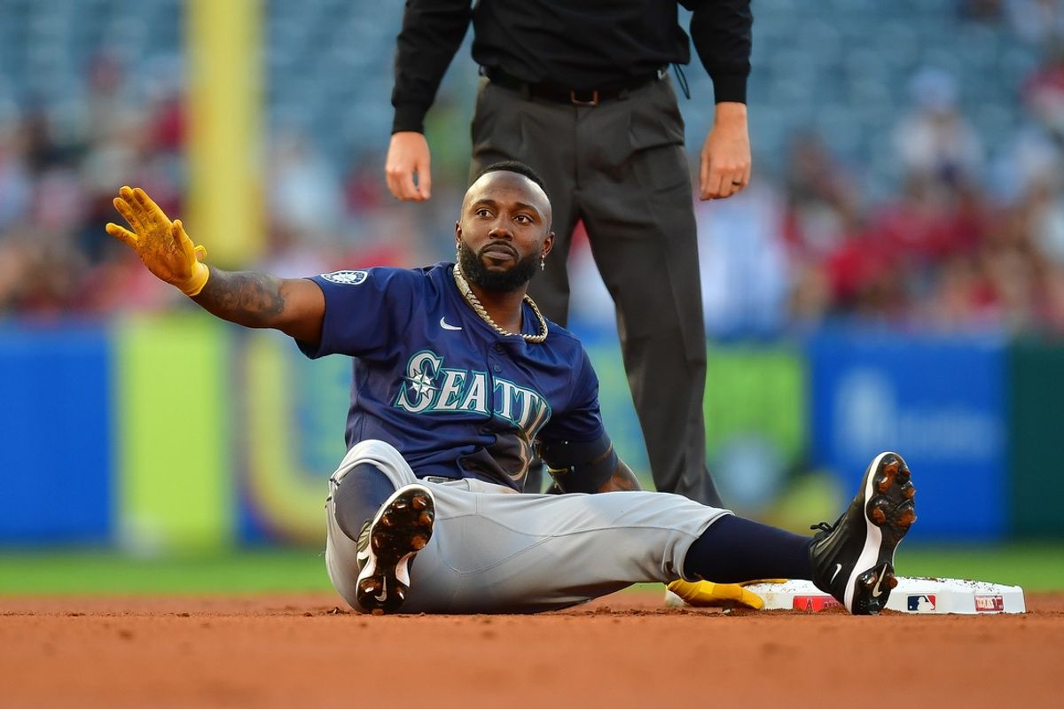 Aug 30, 2024; Anaheim, California, USA; Seattle Mariners left fielder Randy Arozarena (56) reaches second on a double against the Los Angeles Angels during the first inning at Angel Stadium. Mandatory Credit: Gary A. Vasquez-Imagn Images