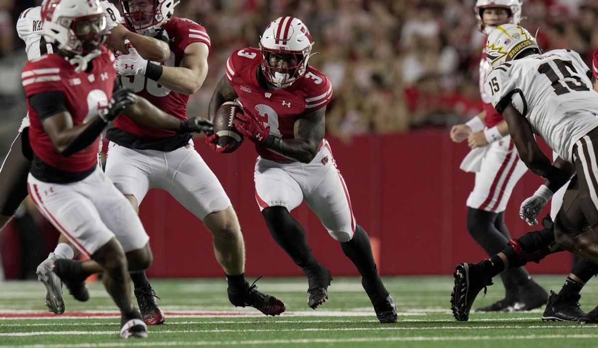 Wisconsin running back Tawee Walker (3) find s an opening in the Western Michigan defense during the first quarter of their game Friday, August 30, 2024 at Camp Randall Stadium in Madison, Wisconsin.