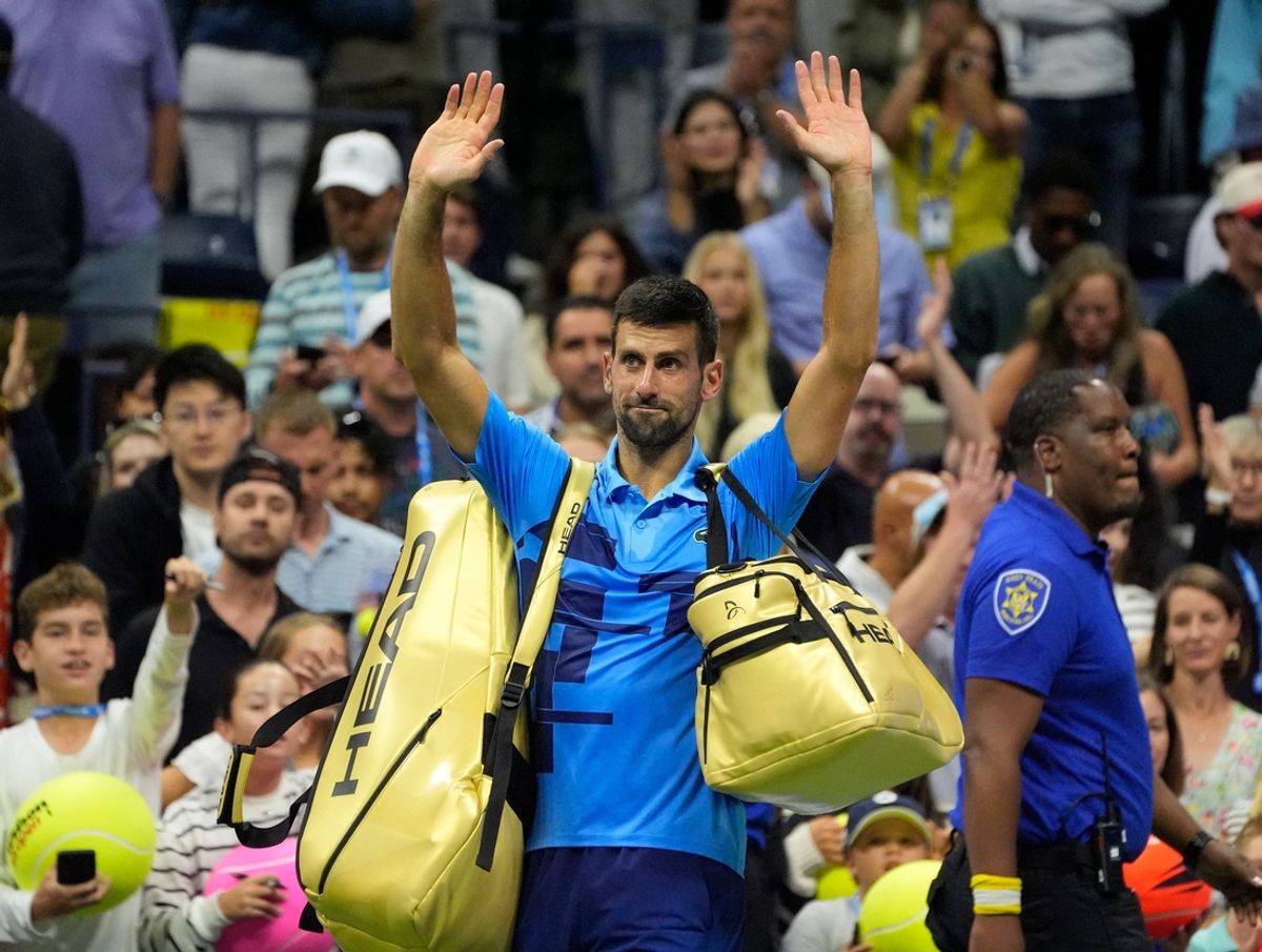 Aug 30, 2024; Flushing, NY, USA;  Novak Djokovic (SRB) after losing to Alexei Popyrin (AUS) on day five of the 2024 U.S. Open tennis tournament at USTA Billie Jean King National Tennis Center. Mandatory Credit: Robert Deutsch-Imagn Images