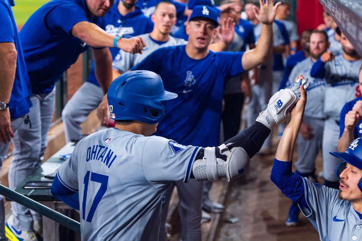 Aug 30, 2024; Phoenix, Arizona, USA; Los Angeles Dodgers designated hitter Shohei Ohtani (17) reacts after hitting a solo home run in the eighth inning during a game against the Arizona Diamondbacks at Chase Field. Mandatory Credit: Allan Henry-USA TODAY Sports