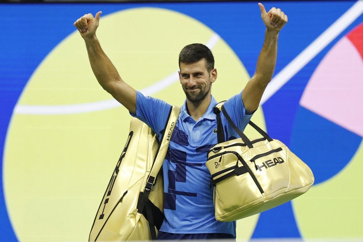 Aug 30, 2024; Flushing, NY, USA; Novak Djokovic (SRB) waves to the crowd while leaving the court after his match Alexei Popyrin (AUS) celebrates after his match against(not pictured) in a men's singles match on day five of the 2024 U.S. Open tennis tournament at Billie Jean King USTA National Tennis Center. Mandatory Credit: Geoff Burke-Imagn Images