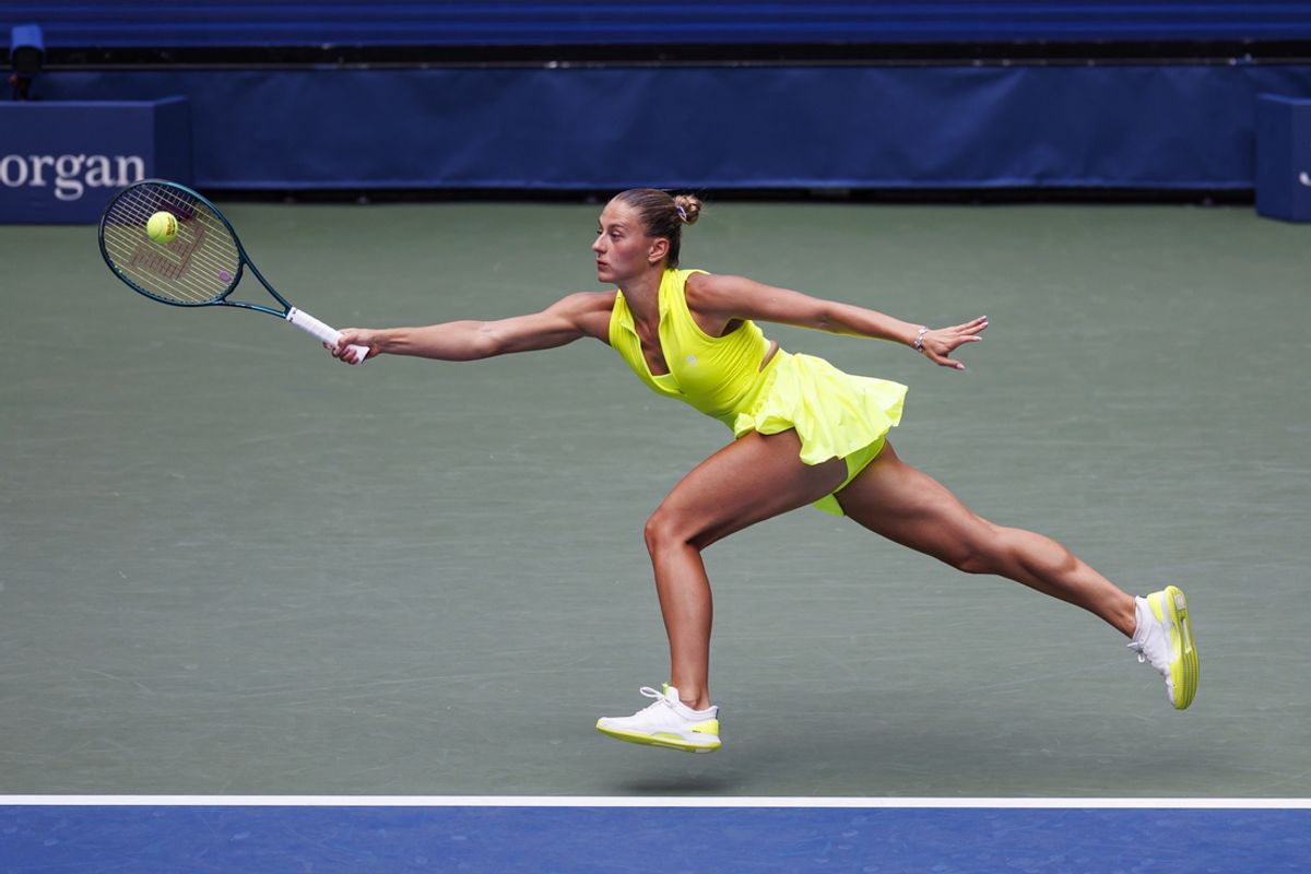Aug 30, 2024; Flushing, NY, USA; Marta Kostyuk of Ukraine in action against Emma Navarro of the United States on day five of the 2024 U.S. Open tennis tournament at the USTA Billie Jean King National Tennis Center. Mandatory Credit: Mike Frey-Imagn Images