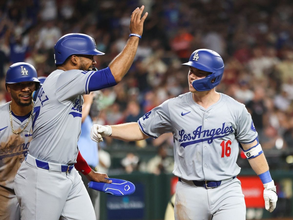 Los Angeles Dodgers catcher Will Smith (16) celebrates after hitting a three-run home run on Aug. 30, 2024 at Chase Field in Phoenix.