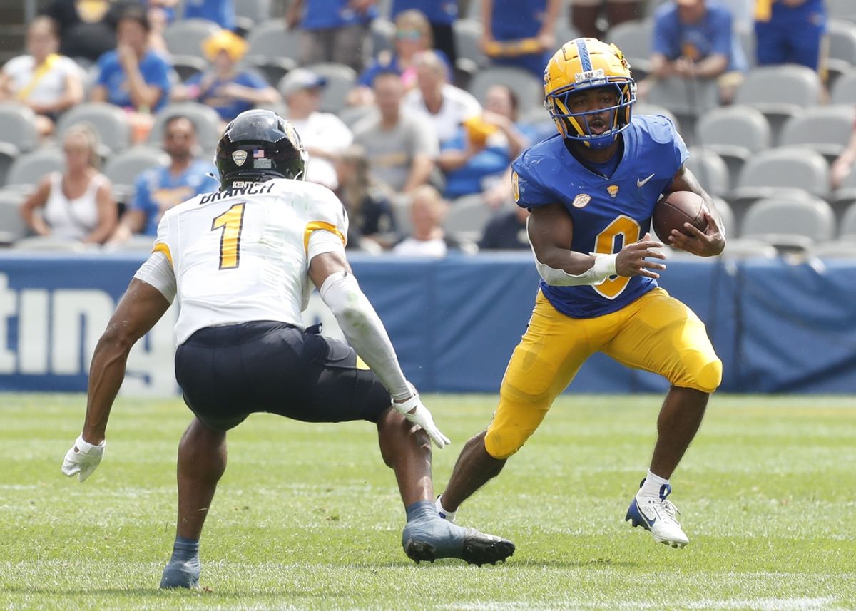 Aug 31, 2024; Pittsburgh, Pennsylvania, USA;  Pittsburgh Panthers running back Desmond Reid (0) runs after a catch against Kent State Golden Flashes safety Alex Branch (1) during the second quarter at Acrisure Stadium. Mandatory Credit: Charles LeClaire-USA TODAY Sports