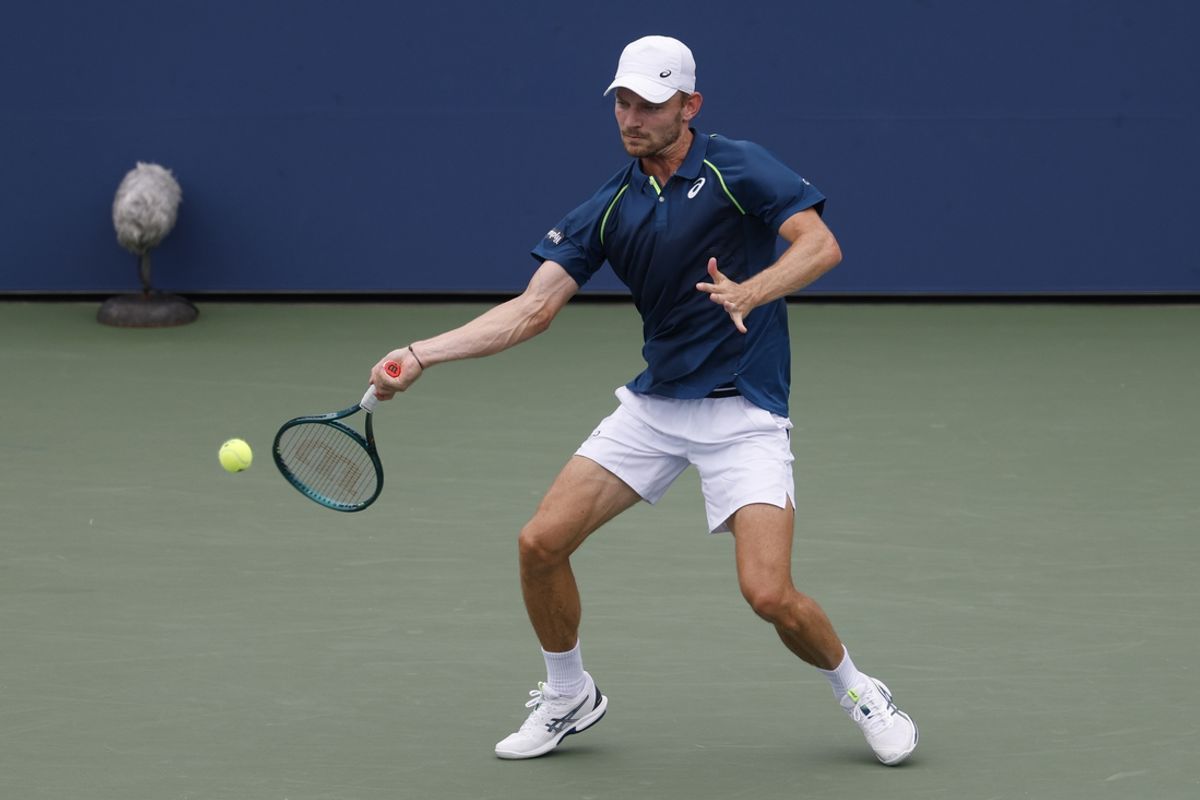 Aug 31, 2024; Flushing, NY, USA; David Goffin (BEL) hits a forehand against Tomas Machac (CZE)(not pictured) in a men's singles match on day six of the 2024 U.S. Open tennis tournament at USTA Billie Jean King National Tennis Center. Mandatory Credit: Geoff Burke-Imagn Images
