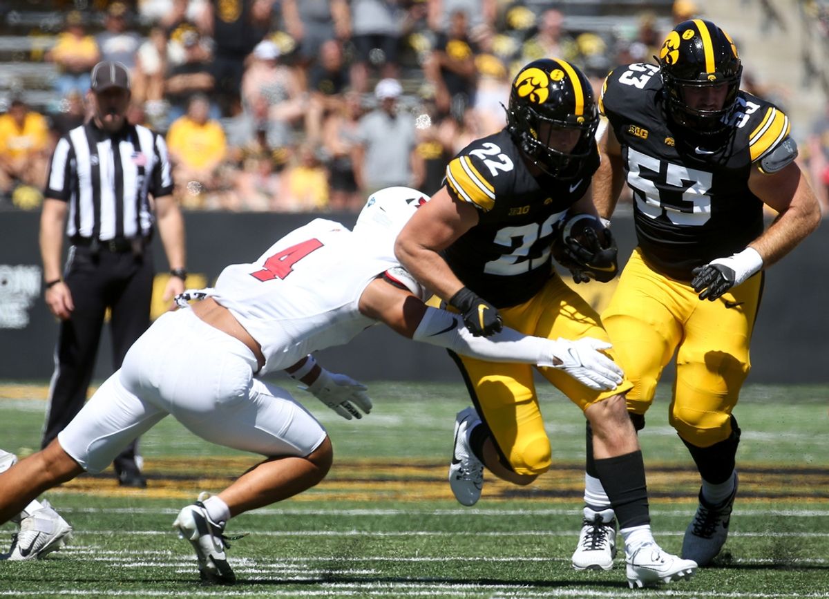 Iowa’s Max White (22) runs the ball against Illinois State Saturday, Aug. 31, 2024 at Kinnick Stadium in Iowa City, Iowa.