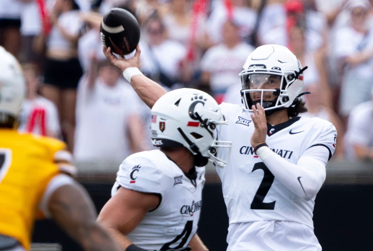 Cincinnati Bearcats quarterback Brendan Sorsby (2) throws a touchdown pass in the first quarter of the College Football game between the Cincinnati Bearcats and the Towson Tigers at Nippert Stadium in Cincinnati on Saturday, Aug. 31, 2024.