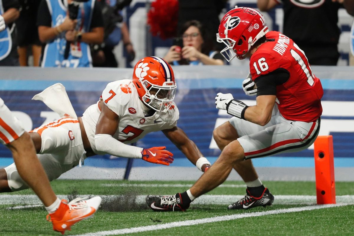 Georgia wide receiver London Humphreys (16) drives past Clemson safety Khalil Barnes (7) for a touchdown during the second half of the NCAA Aflac Kickoff Game against Clemson in Atlanta, on Saturday, Aug. 31, 2024.