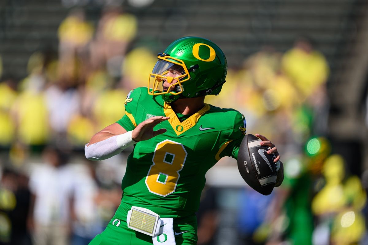 Aug 31, 2024; Eugene, Oregon, USA; Oregon Ducks quarterback Dillon Gabriel (8) throws a pass warming up before the game against the Idaho Vandals at Autzen Stadium. Mandatory Credit: Craig Strobeck-Imagn Images