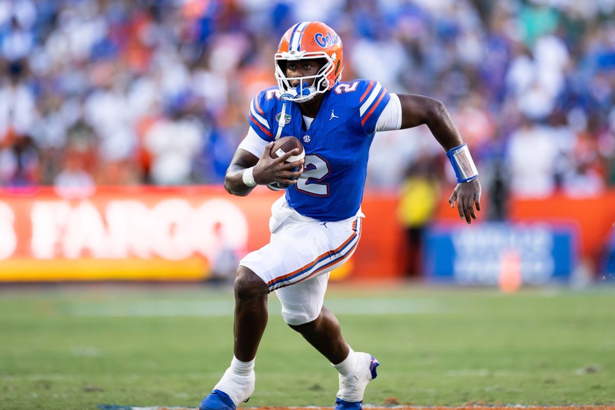 Aug 31, 2024; Gainesville, Florida, USA; Florida Gators quarterback DJ Lagway (2) runs with the ball against the Miami Hurricanes during the second half at Ben Hill Griffin Stadium. Mandatory Credit: Matt Pendleton-Imagn Images