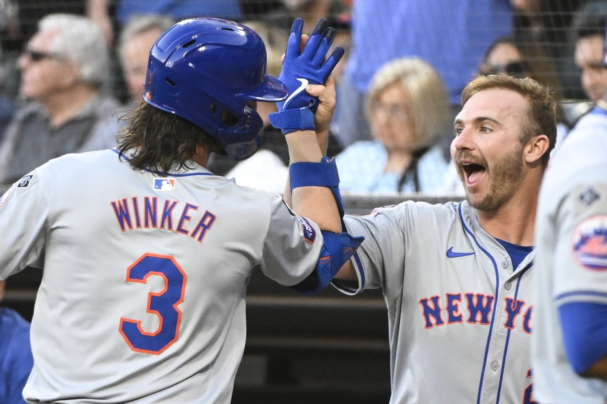 Aug 31, 2024; Chicago, Illinois, USA;  New York Mets first base Pete Alonso (20) high fives  New York Mets outfielder Jesse Winker (3) after he hit a home run during the first inning against the Chicago White Sox at Guaranteed Rate Field. Mandatory Credit: Matt Marton-USA TODAY Sports