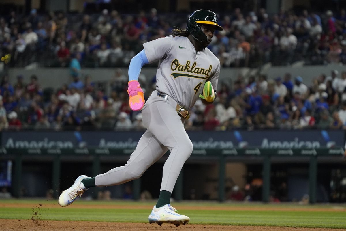 Aug 31, 2024; Arlington, Texas, USA; Oakland Athletics right fielder Lawrence Butler (4) runs to home plate during the sixth inning against the Texas Rangers at Globe Life Field. Mandatory Credit: Raymond Carlin III-USA TODAY Sports