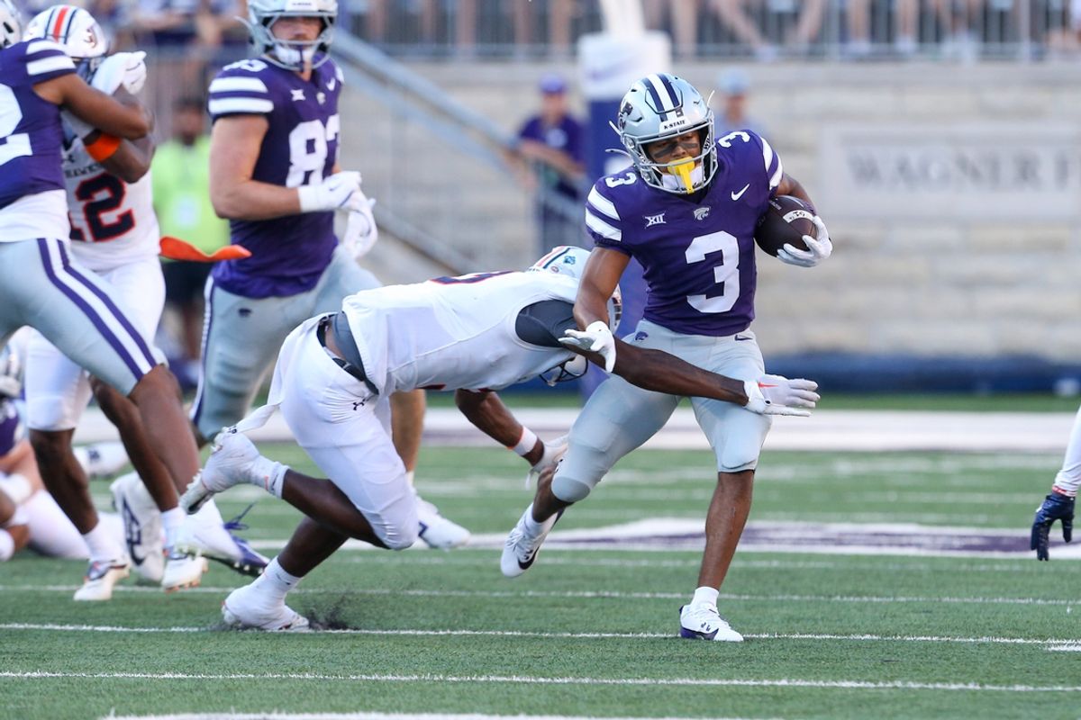 Aug 31, 2024; Manhattan, Kansas, USA; Kansas State Wildcats running back Dylan Edwards (3) is tackled by Tennessee-Martin Skyhawks cornerback Robert Johnson (3) during the first quarter at Bill Snyder Family Football Stadium. Mandatory Credit: Scott Sewell-USA TODAY Sports
