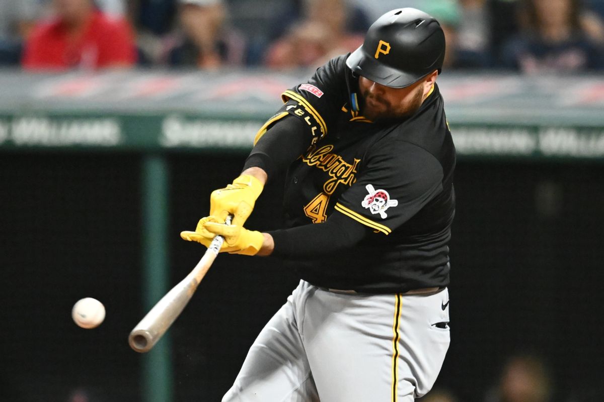 Aug 31, 2024; Cleveland, Ohio, USA; Pittsburgh Pirates first baseman Rowdy Tellez (44) hits an RBI single during the eighth inning against the Cleveland Guardians at Progressive Field. Mandatory Credit: Ken Blaze-USA TODAY Sports
