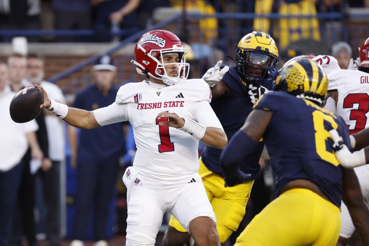 Aug 31, 2024; Ann Arbor, Michigan, USA;  Fresno State Bulldogs quarterback Mikey Keene (1) drops back to throw against the Michigan Wolverines in the first half at Michigan Stadium. Mandatory Credit: Rick Osentoski-Imagn Images