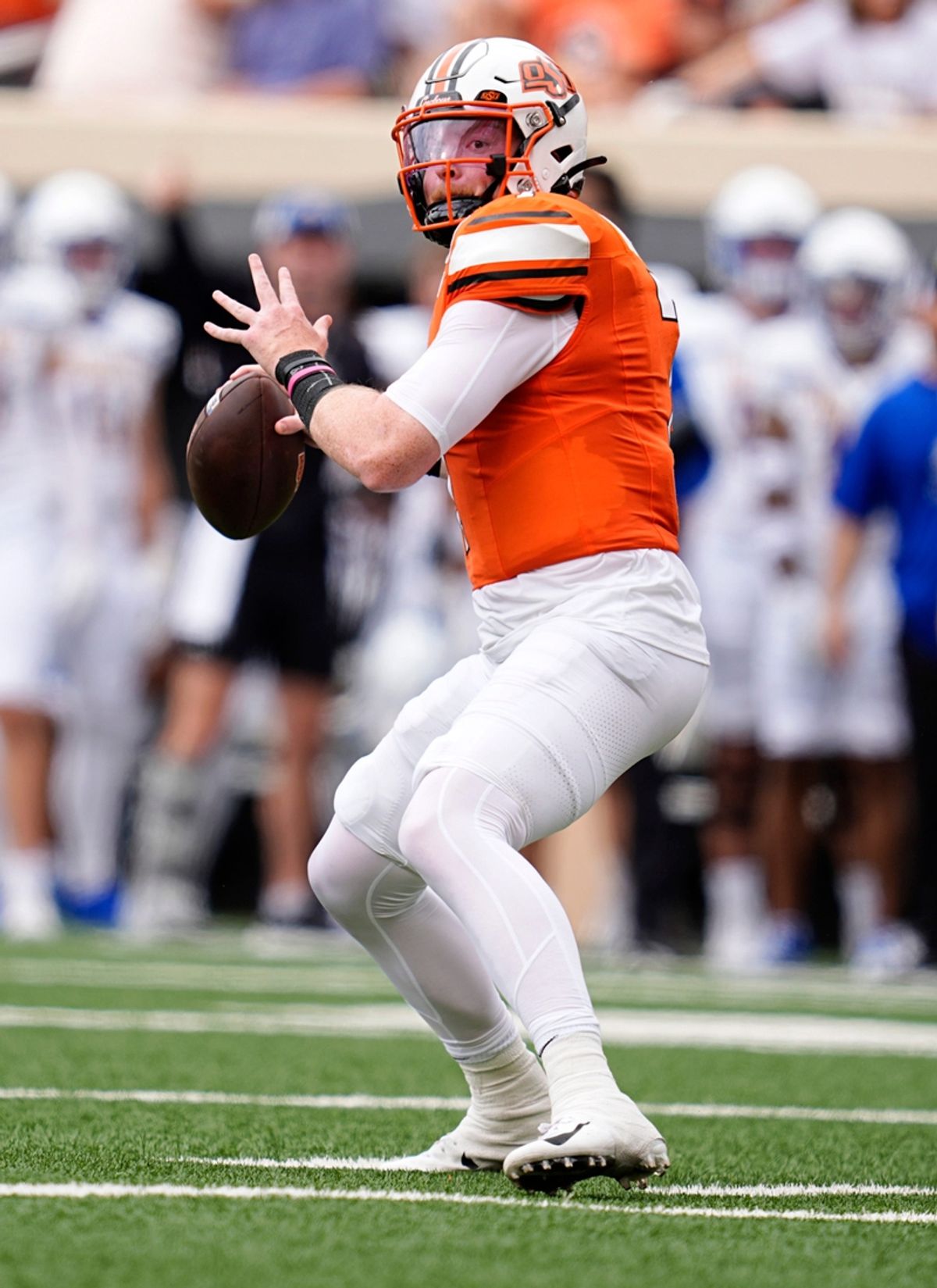 Oklahoma State's Alan Bowman (7) looks to throw a pass in the first half of the college football game between the Oklahoma State Cowboys and South Dakota State Jackrabbits at Boone Pickens Stadium in Stillwater, Okla., Saturday, Aug., 31, 2024.
