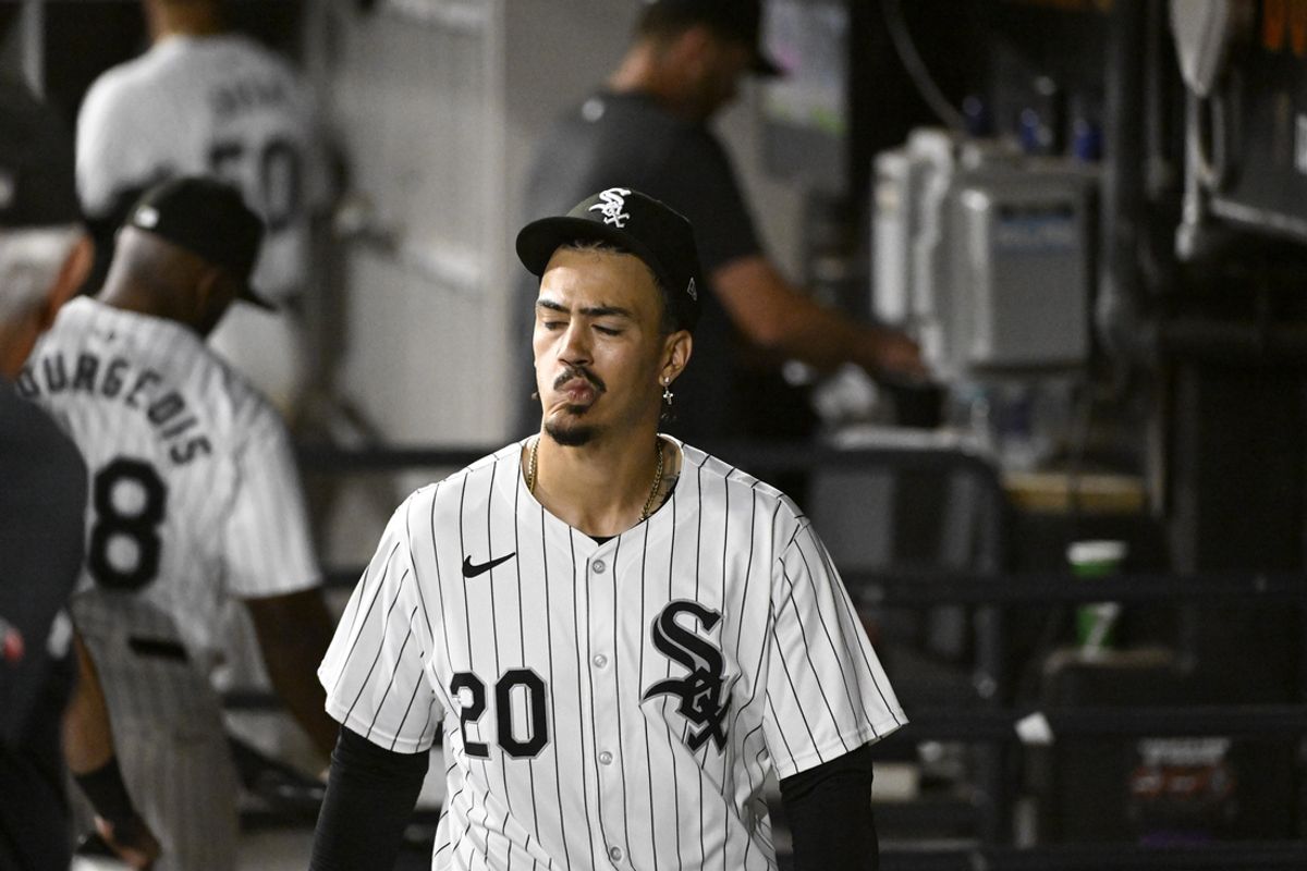 Aug 31, 2024; Chicago, Illinois, USA;  Chicago White Sox outfielder Miguel Vargas (20) is seen in the dugout after the team’s loss to the New York Mets at Guaranteed Rate Field. The team tied their franchise record for most losses in a season.  Mandatory Credit: Matt Marton-USA TODAY Sports
