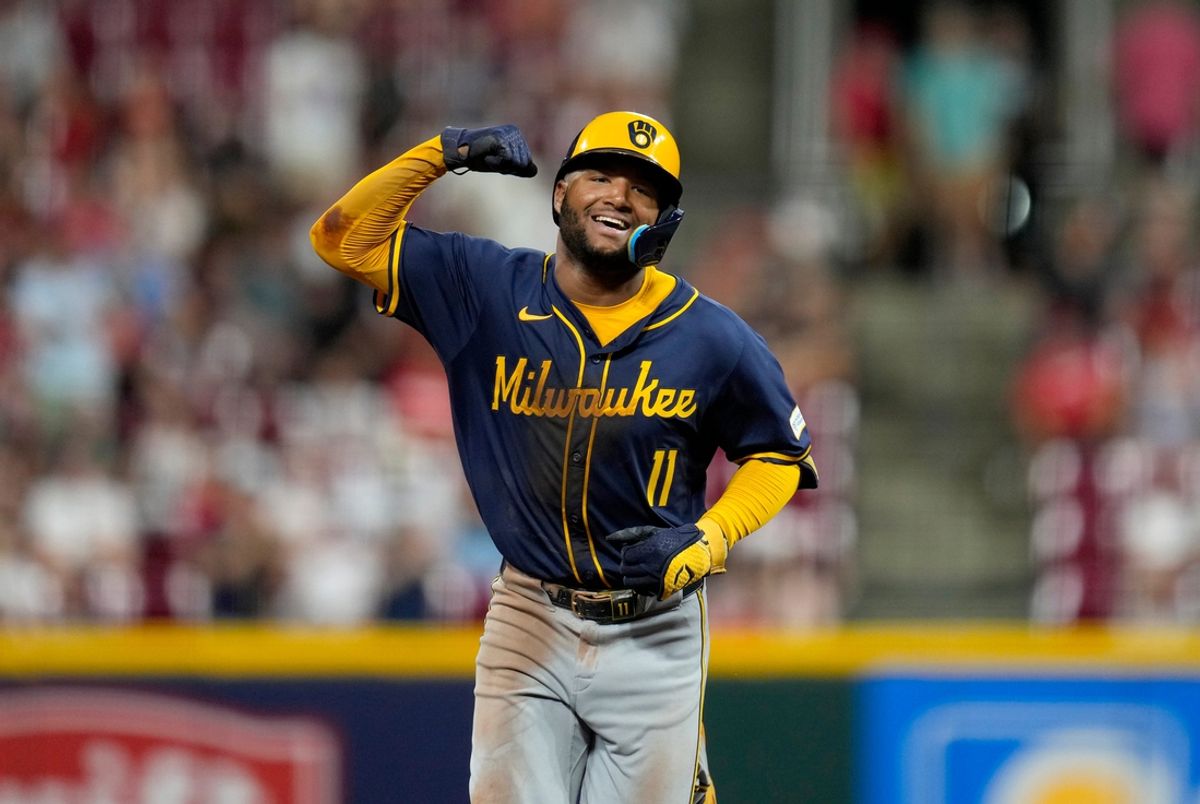 Milwaukee Brewers outfielder Jackson Chourio (11) smiles as he runs the bases after hitting a homer in the 9th inning over the Cincinnati Reds at Great American Ball Park in Cincinnati on Saturday, August 31, 2024. The Brewers won 5-4.