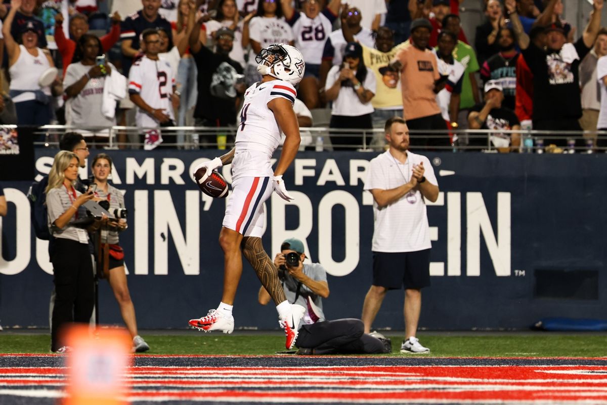 Aug 31, 2024; Tucson, Arizona, USA; Arizona Wildcats wide receiver Tetairoa McMillan (4) celebrates a touchdown during first quarter at Arizona Stadium. at Arizona Stadium. Mandatory Credit: Aryanna Frank-USA TODAY Sports