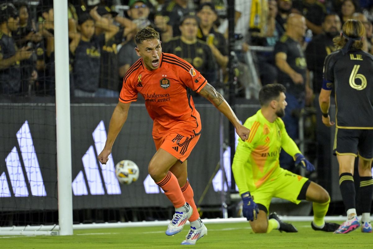 Aug 31, 2024; Los Angeles, California, USA; Houston Dynamo FC forward Ezequiel Ponce (10) celebrates after scoring a goal against LAFC in the first half at BMO Stadium. Mandatory Credit: Jayne Kamin-Oncea-USA TODAY Sports