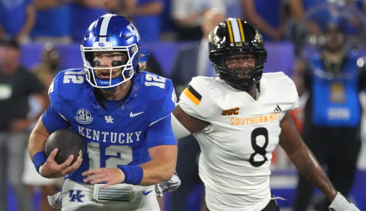 Kentucky’s Brock Vandagriff ran with the football against Southern Miss’ Jalil Clemons Saturday night at Kroger Field.
Aug. 31, 2024