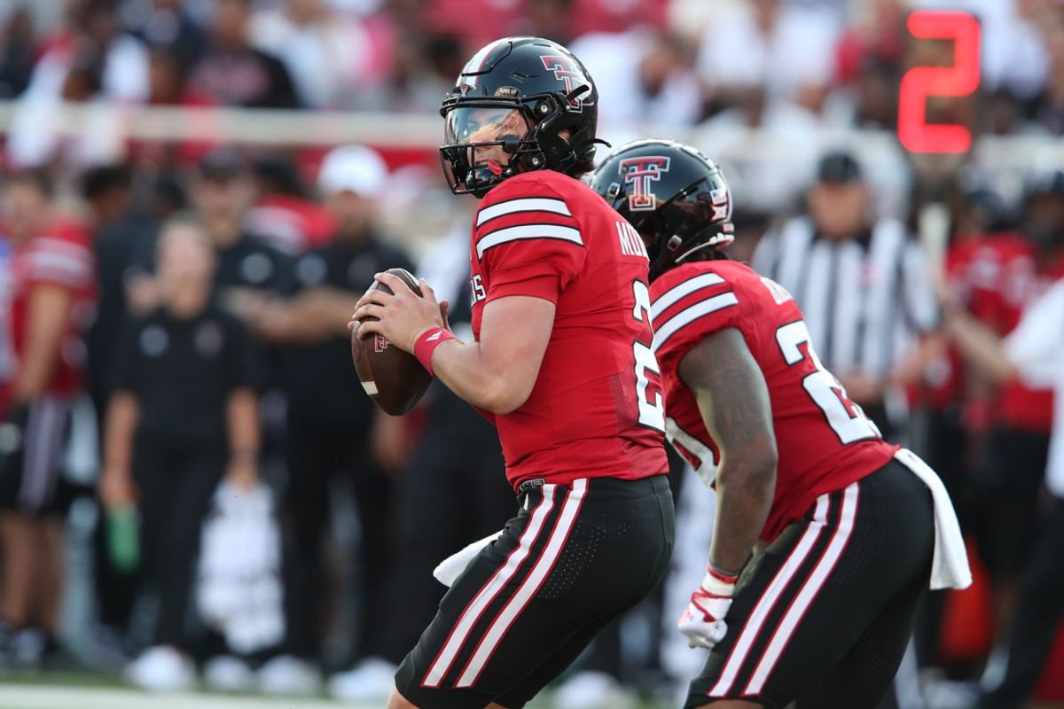 Aug 31, 2024; Lubbock, Texas, USA;  Texas Tech Red Raiders quarterback Behren Morton (2) drops back to pass against the Abilene Christian Wildcats in the first half at Jones AT&T Stadium and Cody Campbell Field. Mandatory Credit: Michael C. Johnson-Imagn Images