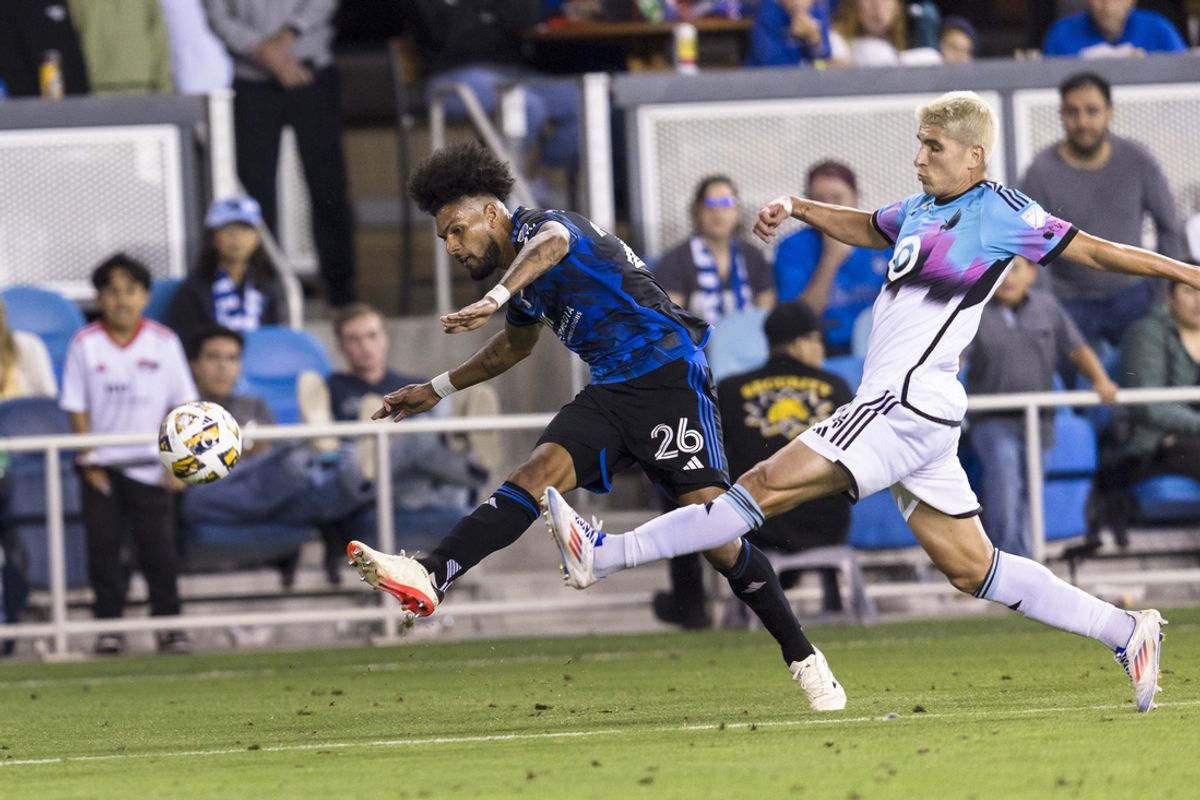 Aug 31, 2024; San Jose, California, USA;  San Jose Earthquakes defender Rodrigues (26) passes the ball against Minnesota United defender Miguel Tapias (4) during the second half at PayPal Park. Mandatory Credit: John Hefti-USA TODAY Sports