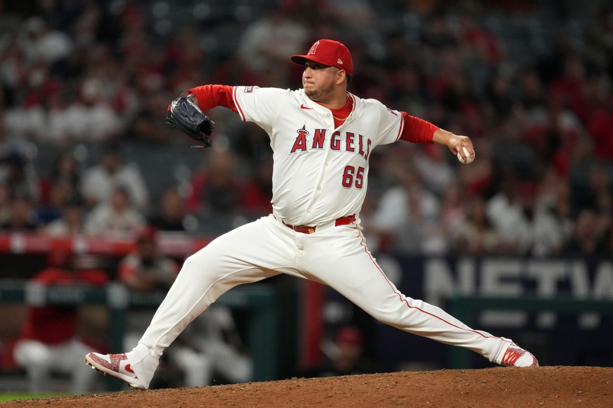 Aug 31, 2024; Anaheim, California, USA; Los Angeles Angels relief pitcher Jose Quijada (65) throws in the eighth inning against the Seattle Mariners at Angel Stadium. Mandatory Credit: Kirby Lee-Imagn Images
