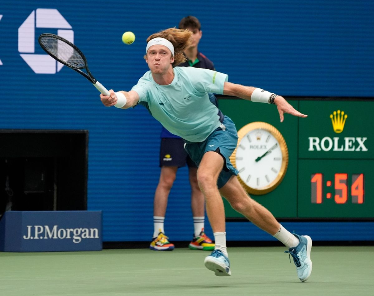 Sep 1, 2024; Flushing, NY, USA;   Andrey Rublev hits to Grigor Dimitrov (BUL) on day seven of the 2024 U.S. Open tennis tournament at USTA Billie Jean King National Tennis Center. Mandatory Credit: Robert Deutsch-Imagn Images