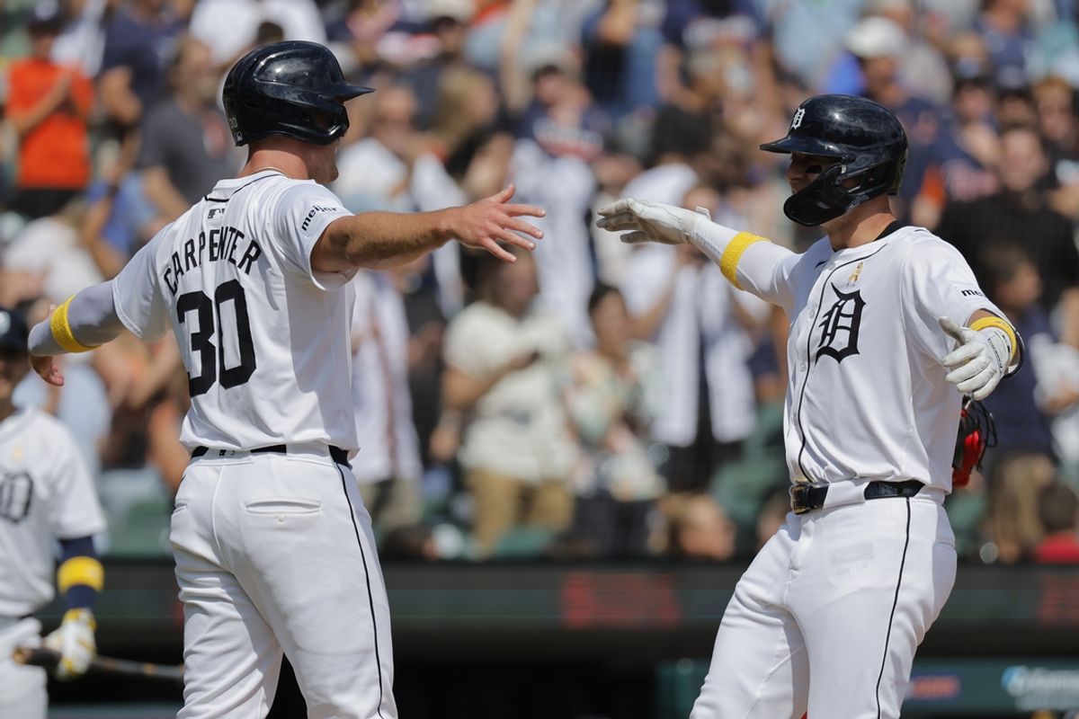 Sep 1, 2024; Detroit, Michigan, USA;  Detroit Tigers first base Spencer Torkelson (20) celebrates with outfielder Kerry Carpenter (30) after he hits a two run home run in the fifth inning against the Boston Red Sox at Comerica Park. Mandatory Credit: Rick Osentoski-USA TODAY Sports