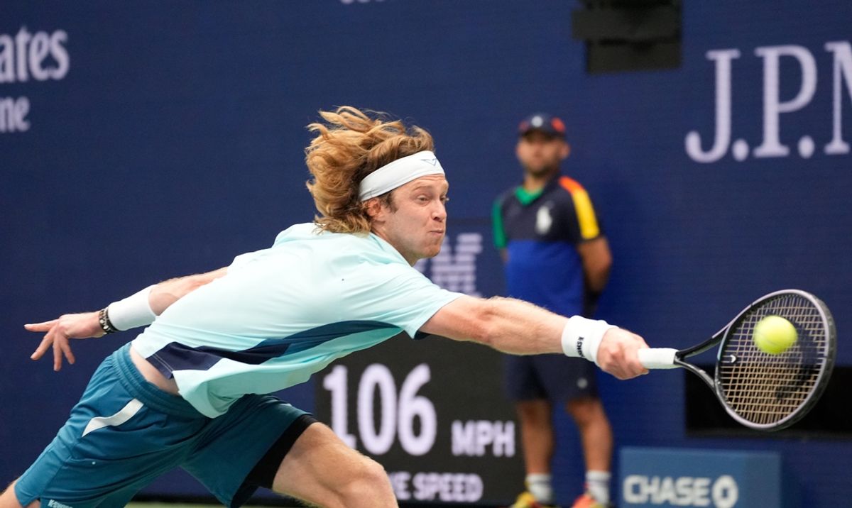 Sep 1, 2024; Flushing, NY, USA;   Andrey Rublev hits to Grigor Dimitrov (BUL) on day seven of the 2024 U.S. Open tennis tournament at USTA Billie Jean King National Tennis Center. Mandatory Credit: Robert Deutsch-Imagn Images