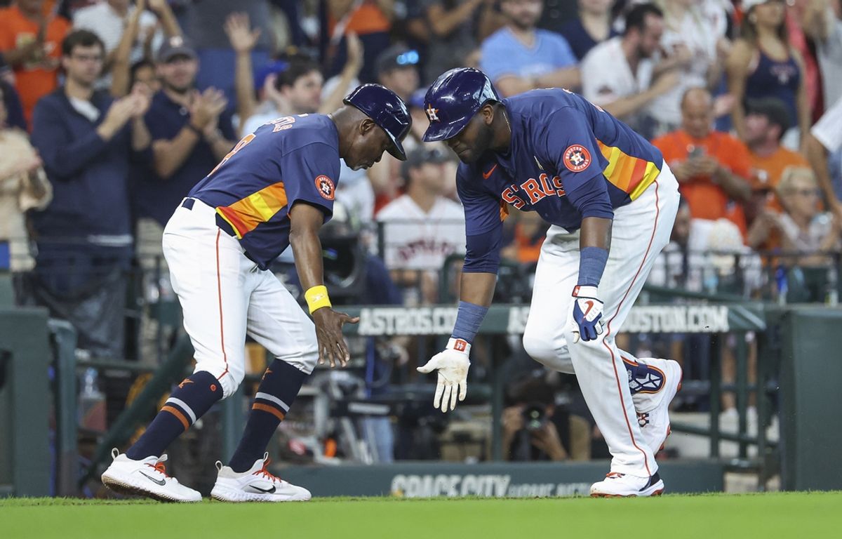 Sep 1, 2024; Houston, Texas, USA; Houston Astros left fielder Yordan Alvarez (44) celebrates with third base coach Gary Pettis (8) after hitting a home run during the sixth inning against the Kansas City Royals at Minute Maid Park. Mandatory Credit: Troy Taormina-USA TODAY Sports