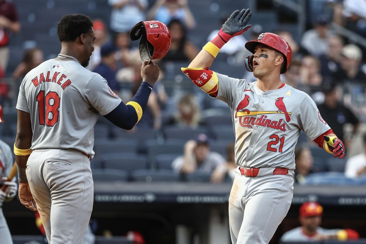 Sep 1, 2024; Bronx, New York, USA;  St. Louis Cardinals left fielder Lars Nootbaar (21) is greeted by right fielder Jordan Walker (18) after hitting a two run home run in the ninth inning against the New York Yankees at Yankee Stadium. Mandatory Credit: Wendell Cruz-USA TODAY Sports