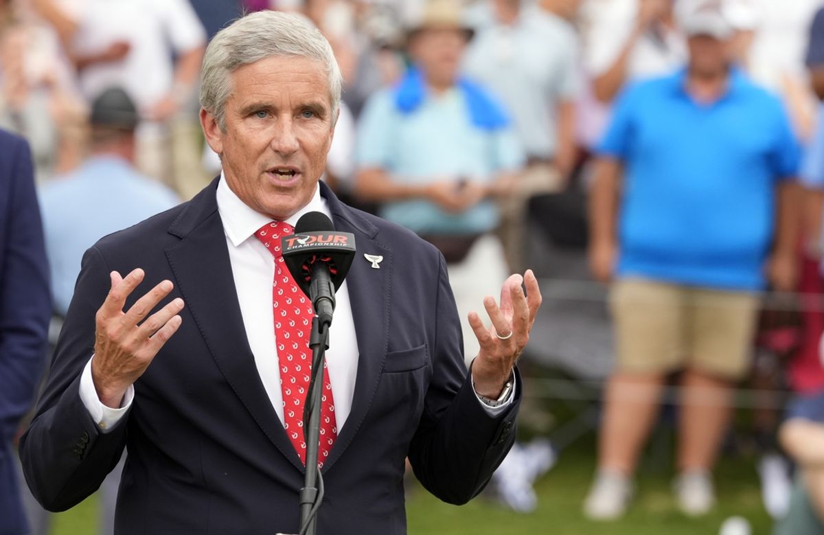 Sep 1, 2024; Atlanta, Georgia, USA; PGA TOUR Commissioner Jay Monahan addresses the gallery gathered on the 18th green after the final round of the TOUR Championship golf tournament. Mandatory Credit: John David Mercer-Imagn Images