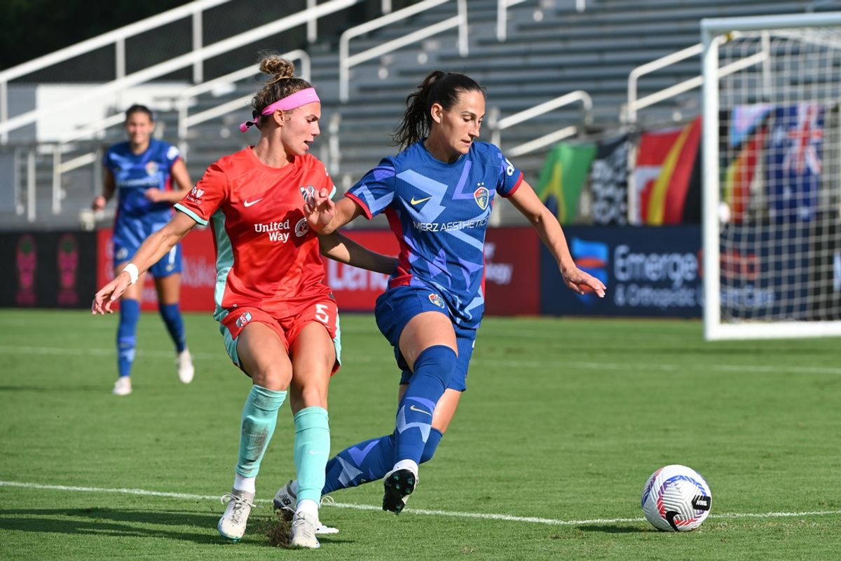 Sep 1, 2024; Cary, North Carolina, USA;  North Carolina Courage defender Kaleigh Kurtz (3) battles for the ball against Kansas City Current defender Ellie Wheeler (5) during the second half at WakeMed Soccer Park. Mandatory Credit: Rob Kinnan-USA TODAY Sports