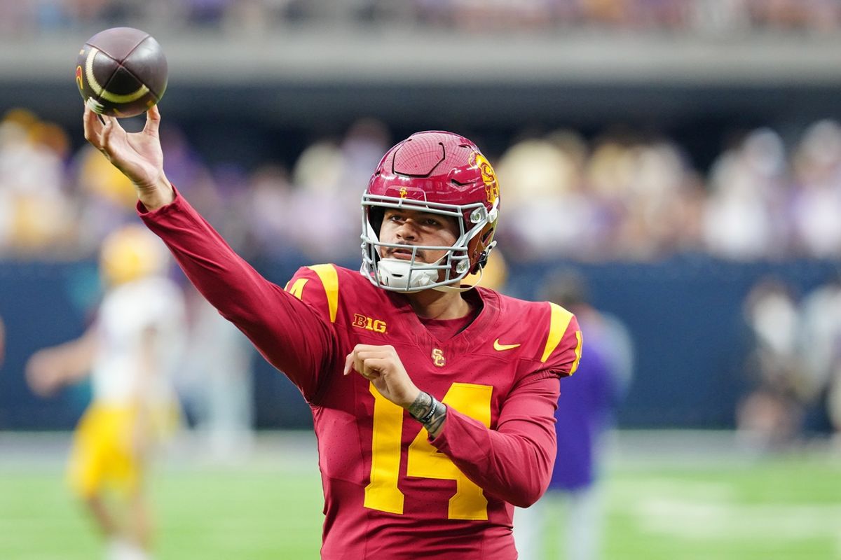 Sep 1, 2024; Paradise, Nevada, USA; Southern California Trojans quarterback Jayden Maiava (14) warms up before a game against the LSU Tigers at Allegiant Stadium. Mandatory Credit: Stephen R. Sylvanie-Imagn Images